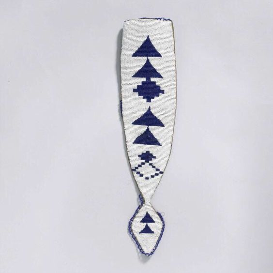 Decorative sheath with blue geometric patterns on a white background