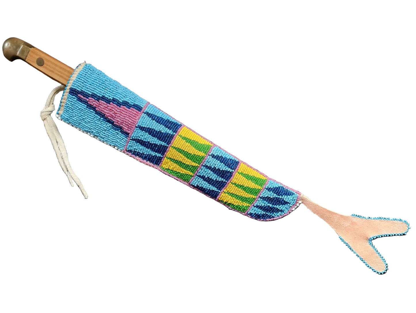 Colorful beaded sheath with wooden handle on a wooden surface
