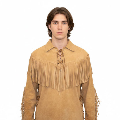 Man wearing a tan fringed shirt on a white background
