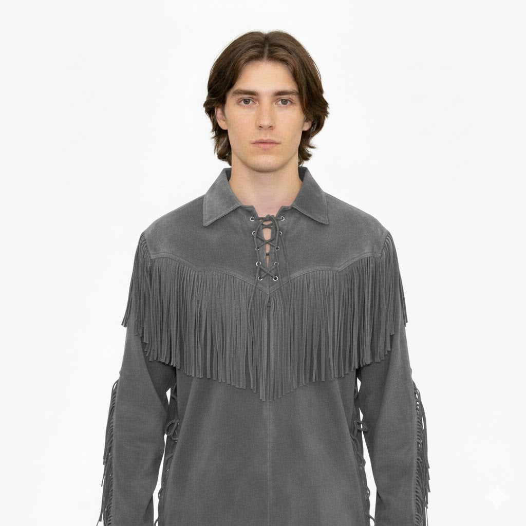 Man wearing a gray suede fringe jacket on a white background