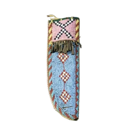 Decorative beaded knife sheath with geometric patterns on a gray background