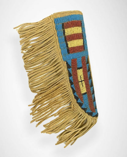 Beaded knife sheath with fringes on a white background