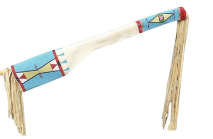 Decorative sheath with colorful patterns and fringes on a white background 