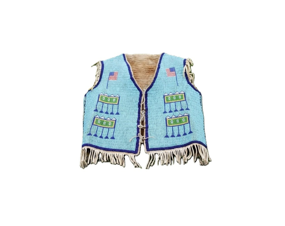 Blue beaded vest with fringe details on a white background