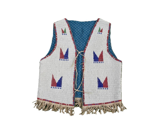 Traditional beaded vest with fringe on a white background