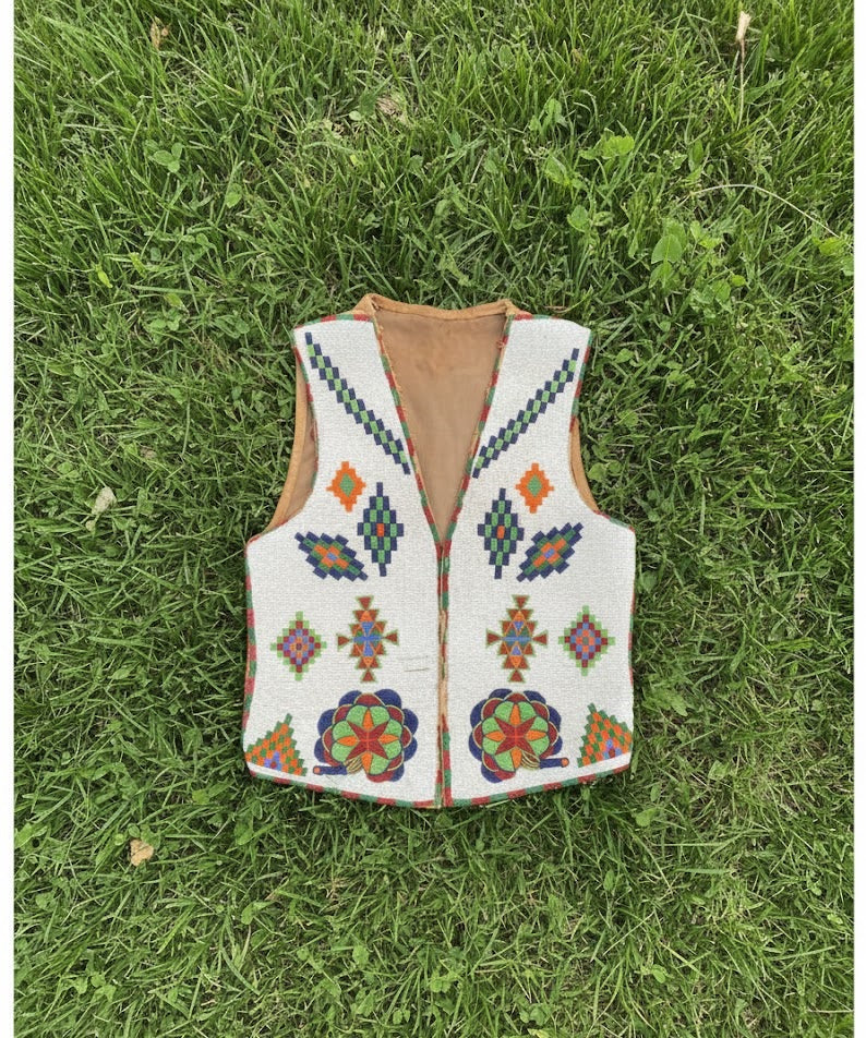 Decorative vest with colorful patterns on a white background