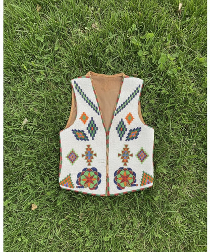 Decorative vest with colorful patterns on a white background