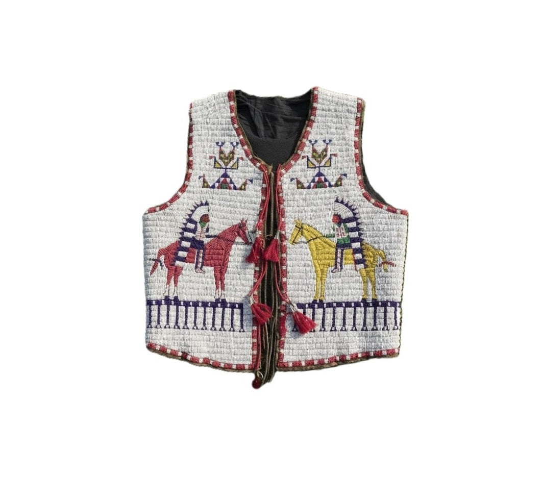 Quilted vest with horse and rider design on a white background