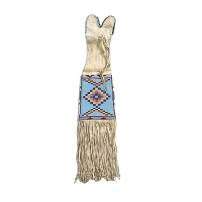 Traditional Native American regalia with a colorful pattern and fringes on a white background