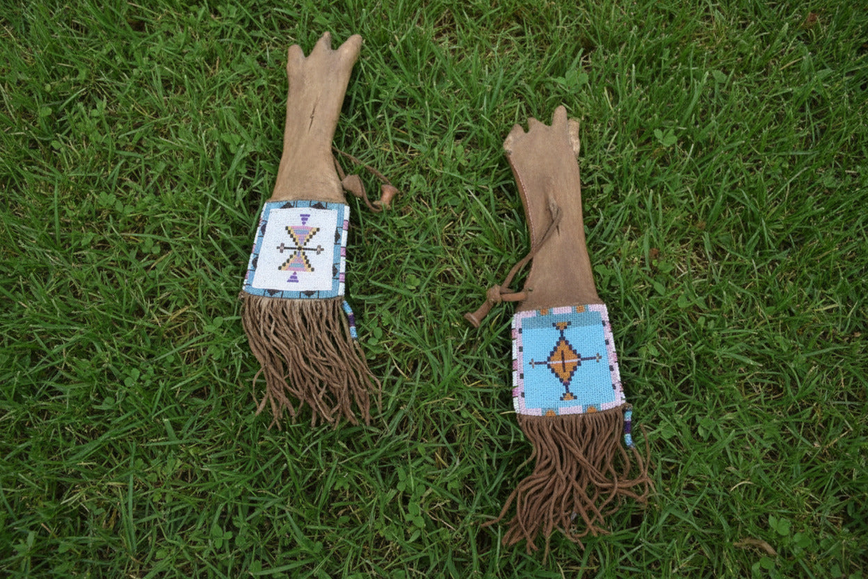 Native American beaded pipe bag front and back  on a white background