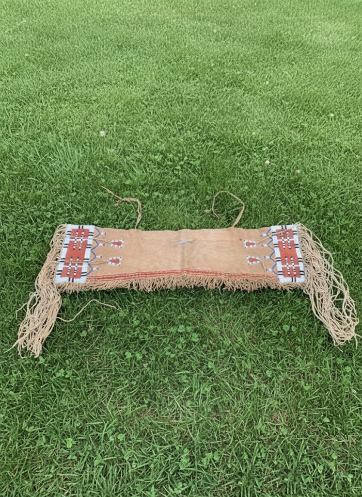 Saddle Bag with fringes on a grassy background