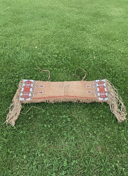 Saddle Bag with fringes on a grassy background