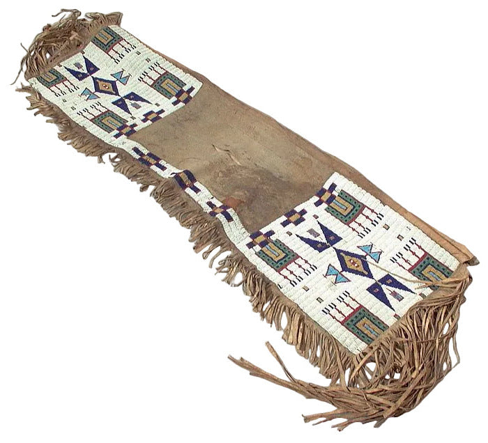 saddle bag with geometric patterns on a white background
