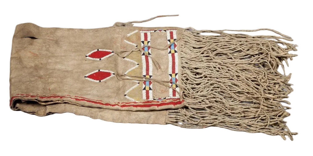 Native American-style saddle bag with fringes and geometric patterns on a white background
