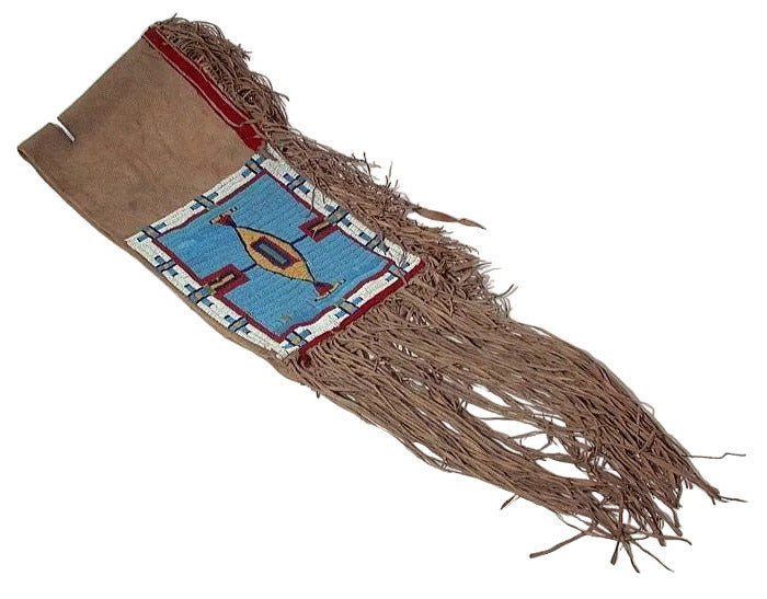Decorative saddle bag with fringes and a colorful pattern on a white background