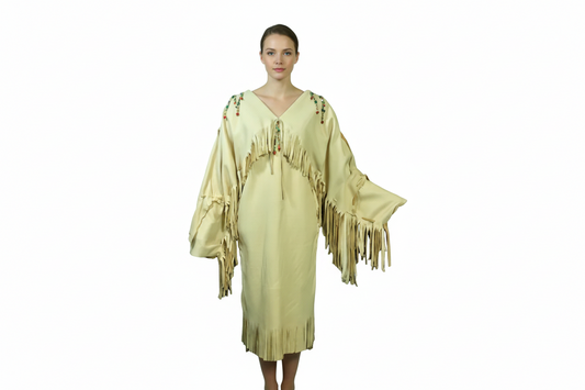 Light yellow fringe dress on a mannequin against a white background
