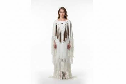 White leather dress poncho with fringe details on a white background