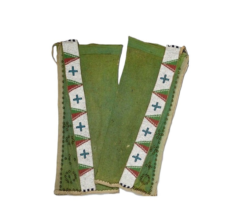 Green suede chaps with geometric patterns on a white background