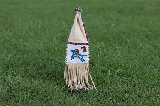 Decorative hanging pipe bag with fringe and colorful patterns on a white background