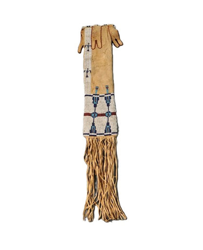 Decorative pipe bag with intricate patterns on a white background